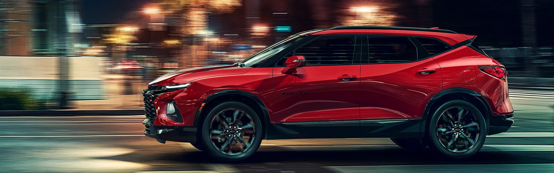 2021 Chevrolet Blazer Driving down road downtown